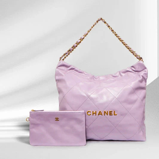 Chanel 22 pink shiny calfskin quilted drawstring bag with gold chain strap and matching Chanel pouch.