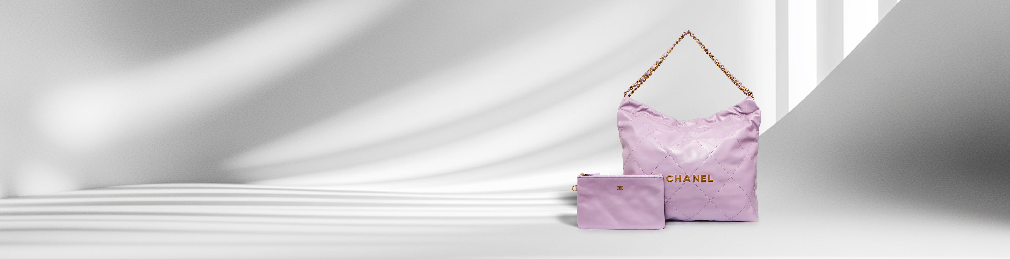 Chanel 22 pink quilted bag and pouch. Cash loans, buy, or sell designer handbags with same-day payouts in Vancouver & Richmond.