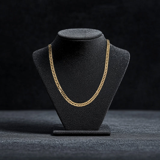 Gold chain necklace on a black display. Richmond Luxury & Loan offers fast cash loans, buying, and selling for fine jewellery